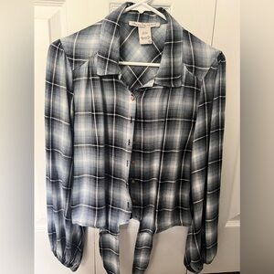 Juniors size small button down shirt with tie at the waist.